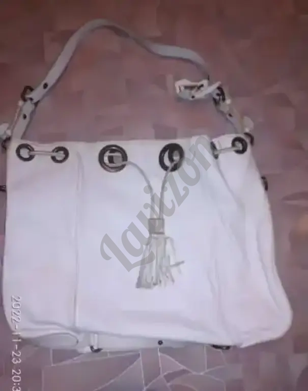 Продам импортную женскую сумку мешок настоящая мягкая кожа слегка бу