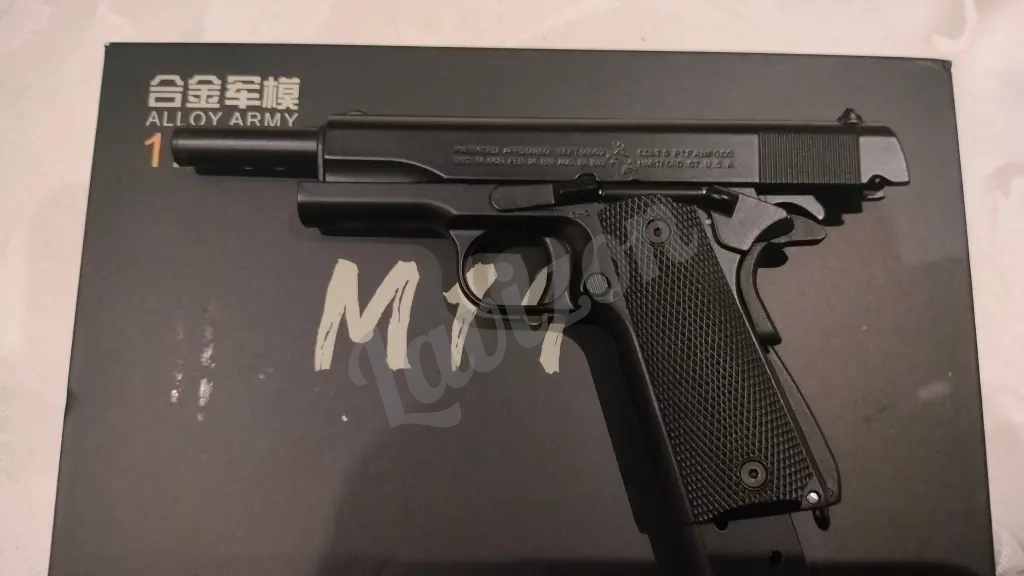 игрушка брелок- пистолет colt